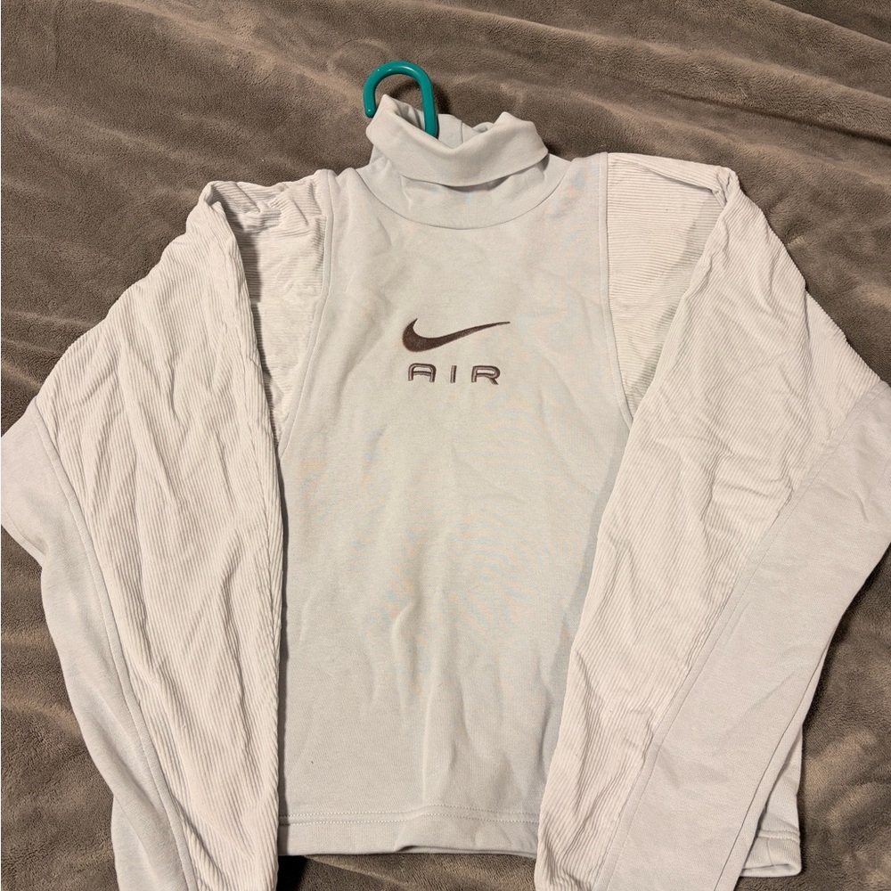 Nike Light blue high neck pull over